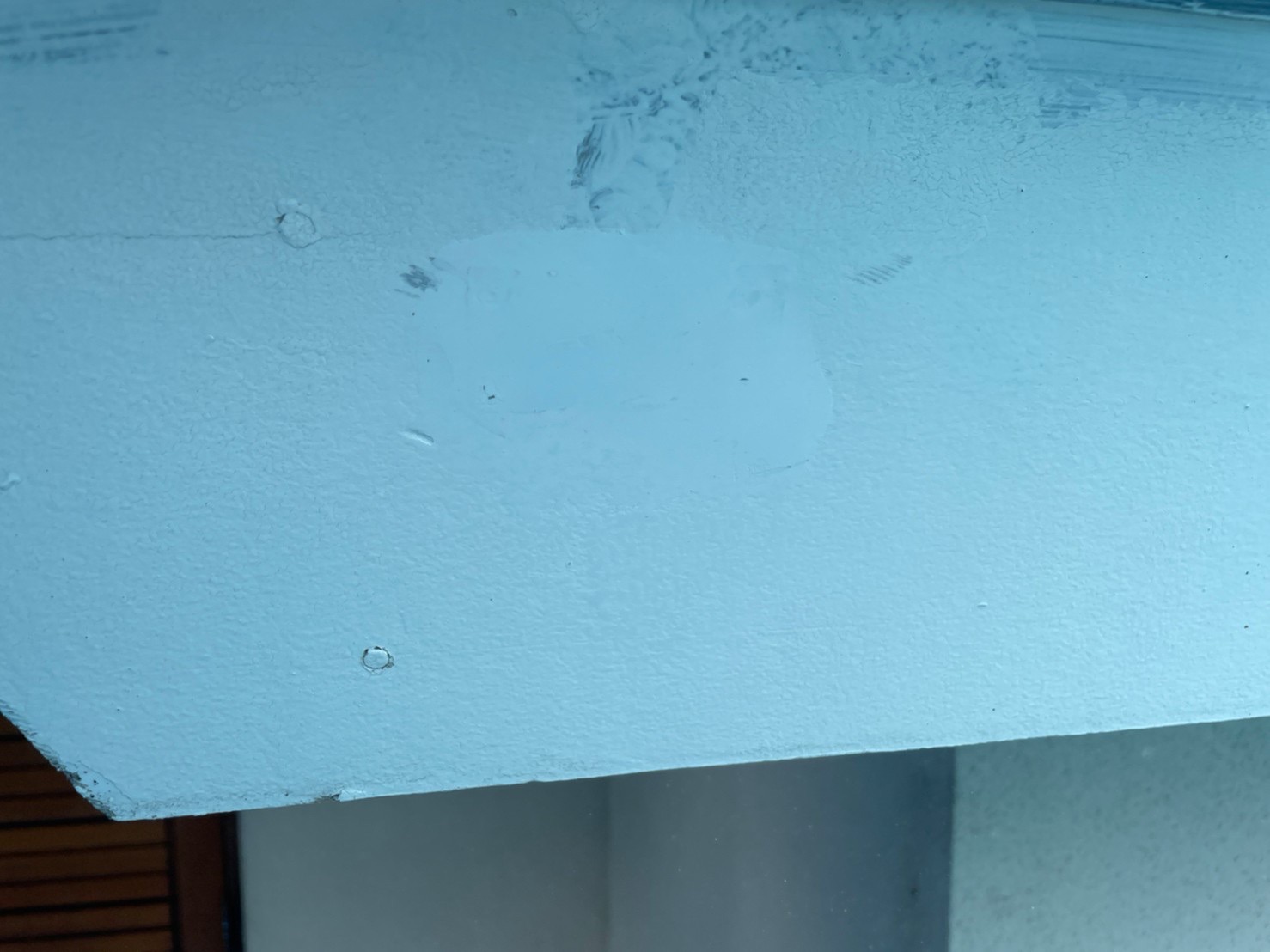 神奈川県茅ヶ崎市　外壁塗装・屋根カバー工事　破風板補修箇所のケレン作業